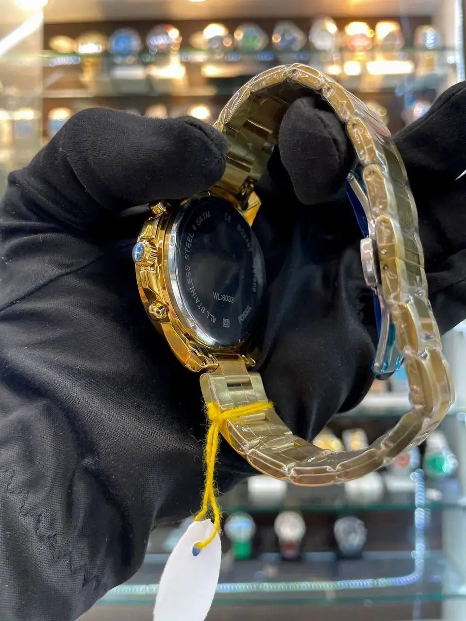 Fossil now in roman dial now in chain for mens