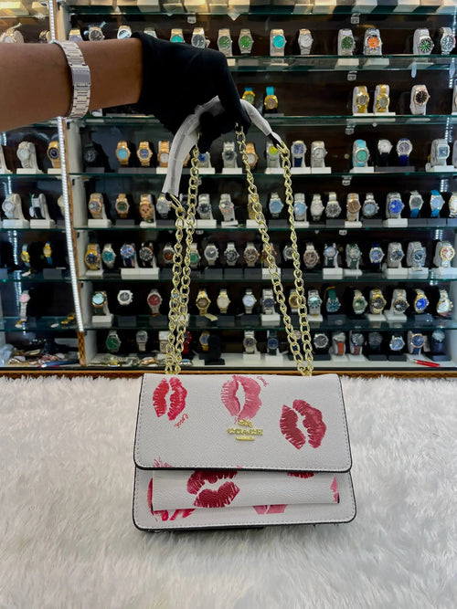 Coach klare crossbody kiss sling bag white body