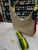 Gucci sling slide bag for girls gold zip