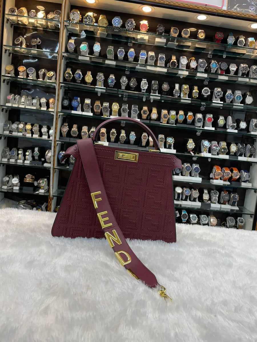 Fendi maroon peekaboo iseeu sling bag in master piece