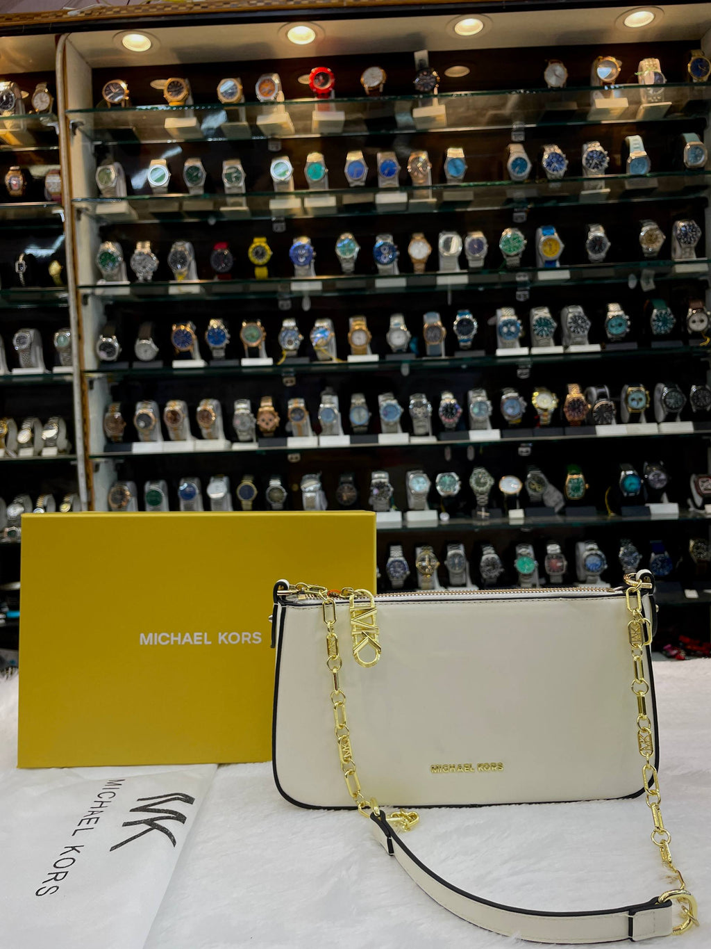 MICHAEL KORS EMPIRE MEDIUM CHAIN-LINK POCHETTE PREMIUM SLING BAG