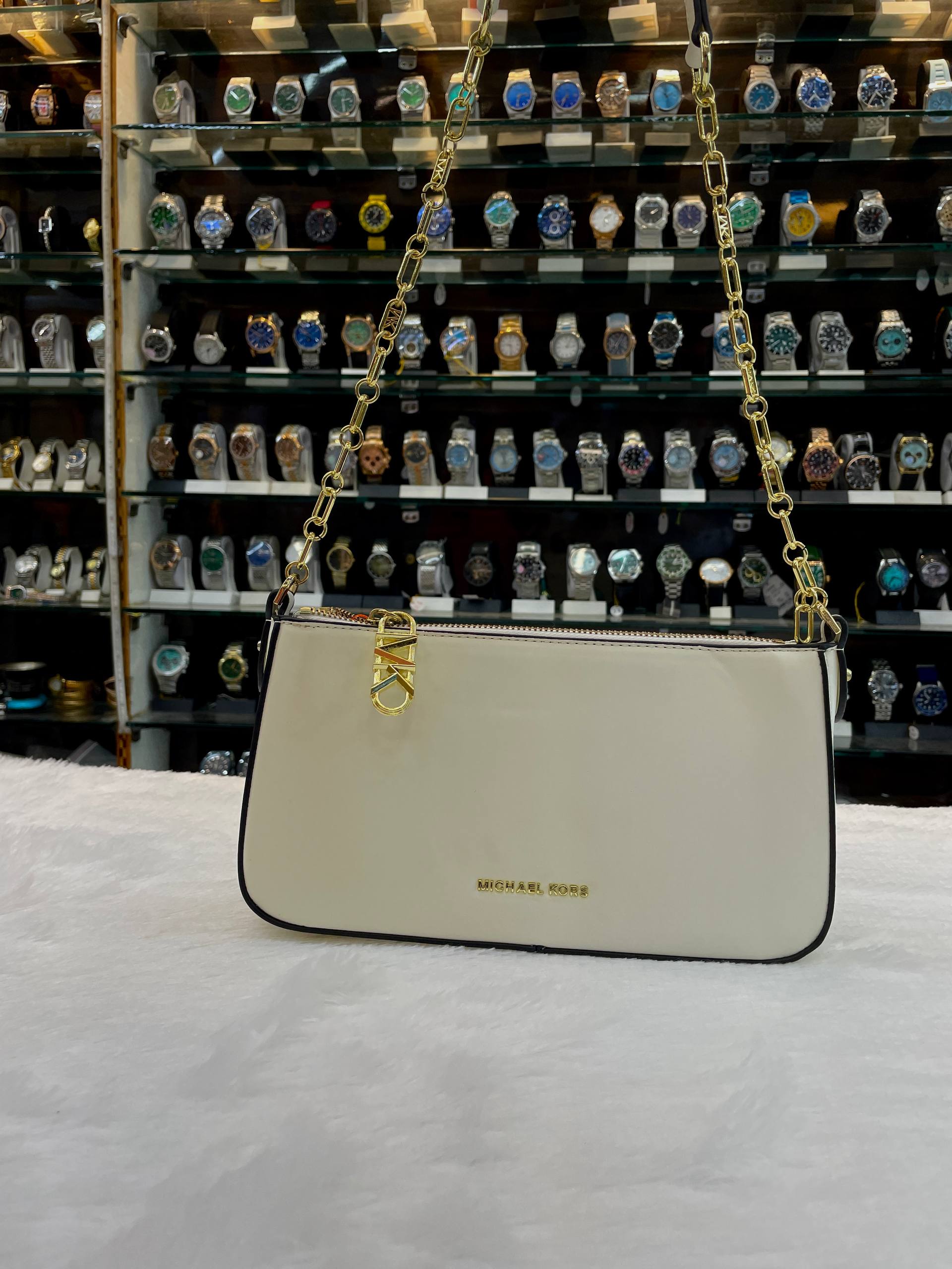 MICHAEL KORS EMPIRE MEDIUM CHAIN-LINK POCHETTE PREMIUM SLING BAG