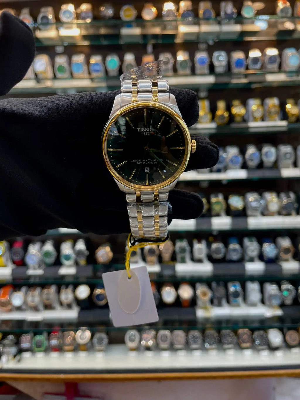 Tissot chemin des tourelles powermatic now in master piece chain green