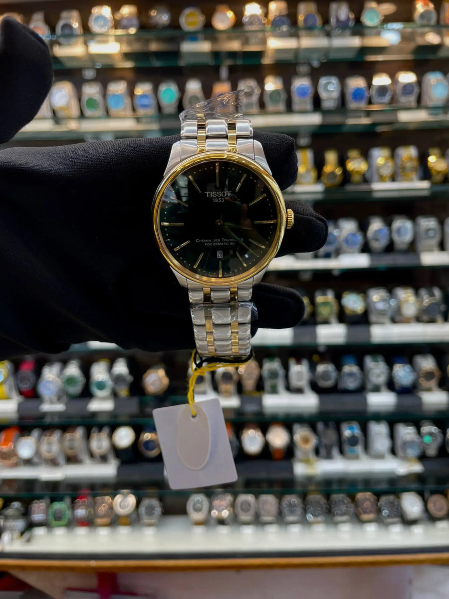 Tissot chemin des tourelles powermatic now in master piece chain green