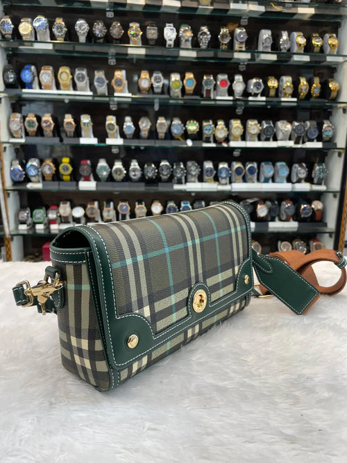 Burberry checks cross body sling bag in master piece for girls