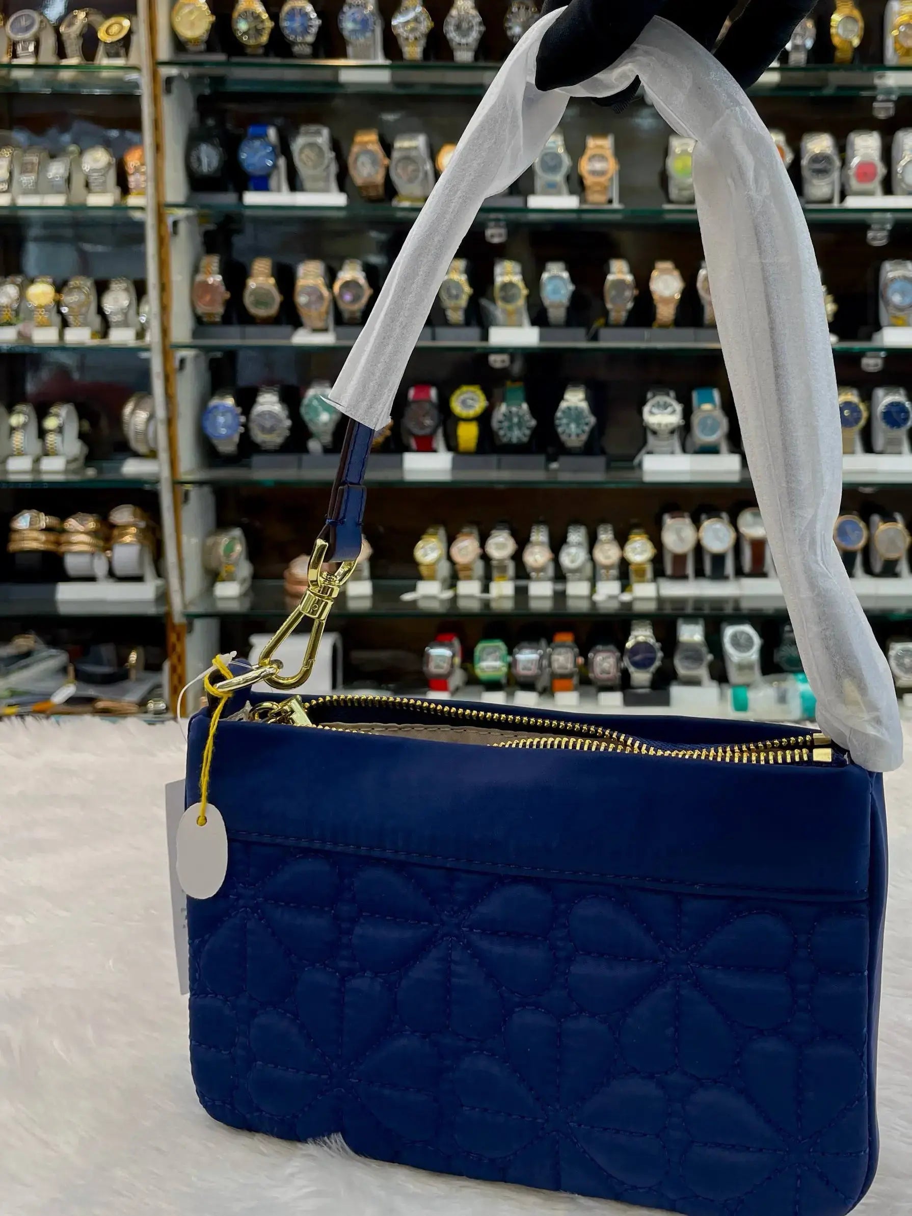 Kate spade new york flower quilted sling bag