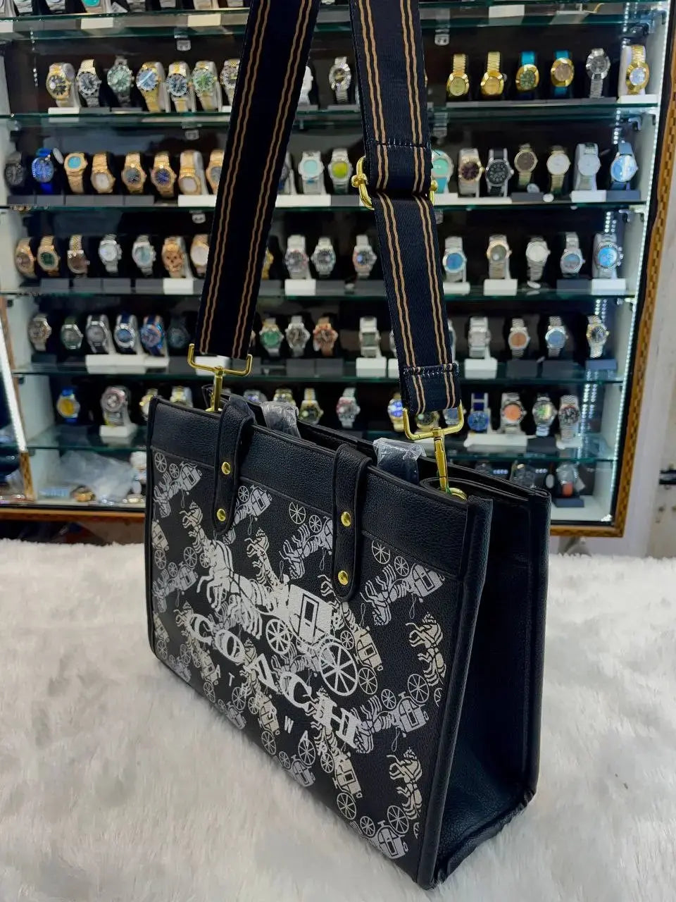 Coach horse and carriage print sling bag