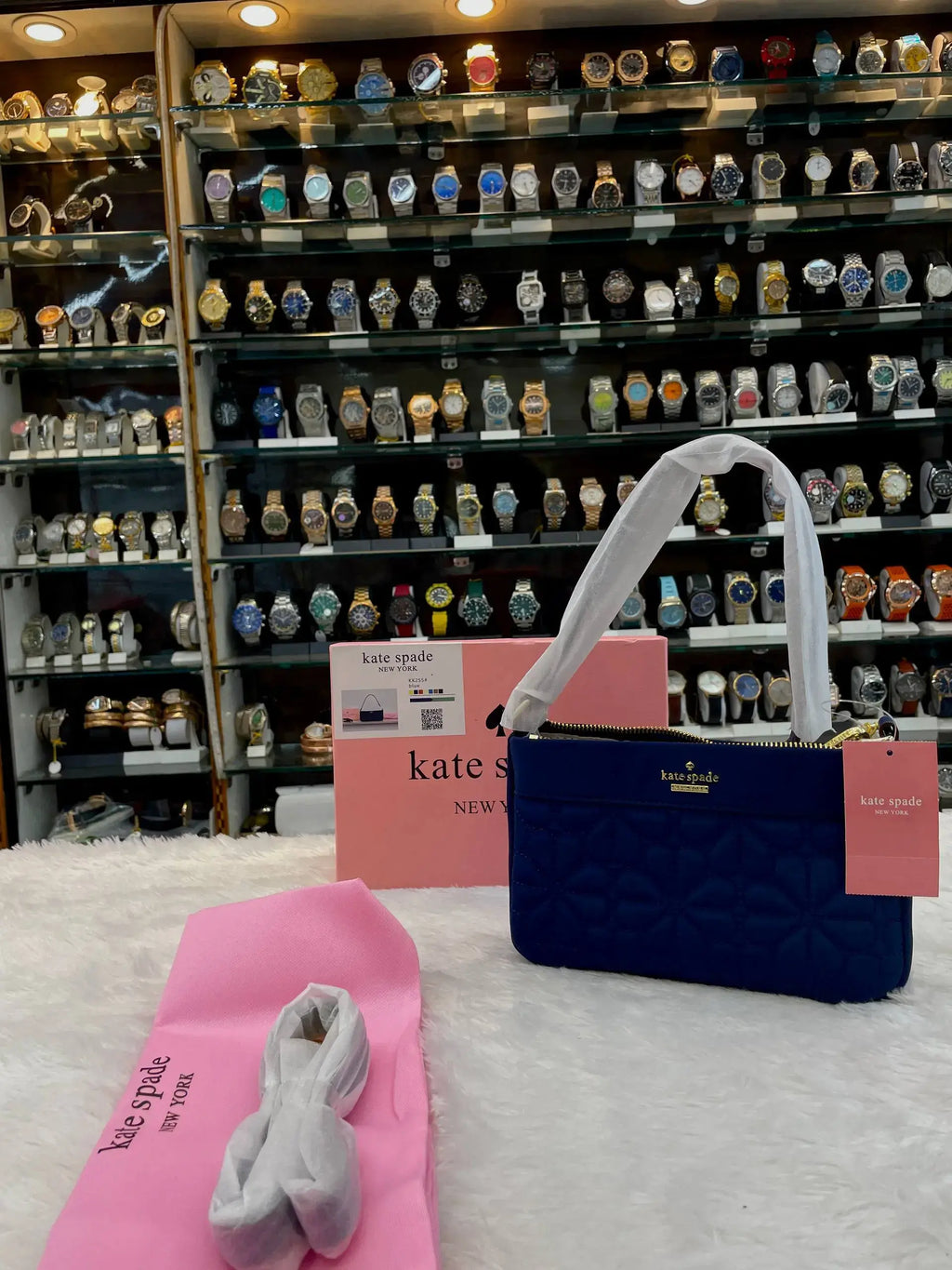 Kate spade new york flower quilted sling bag