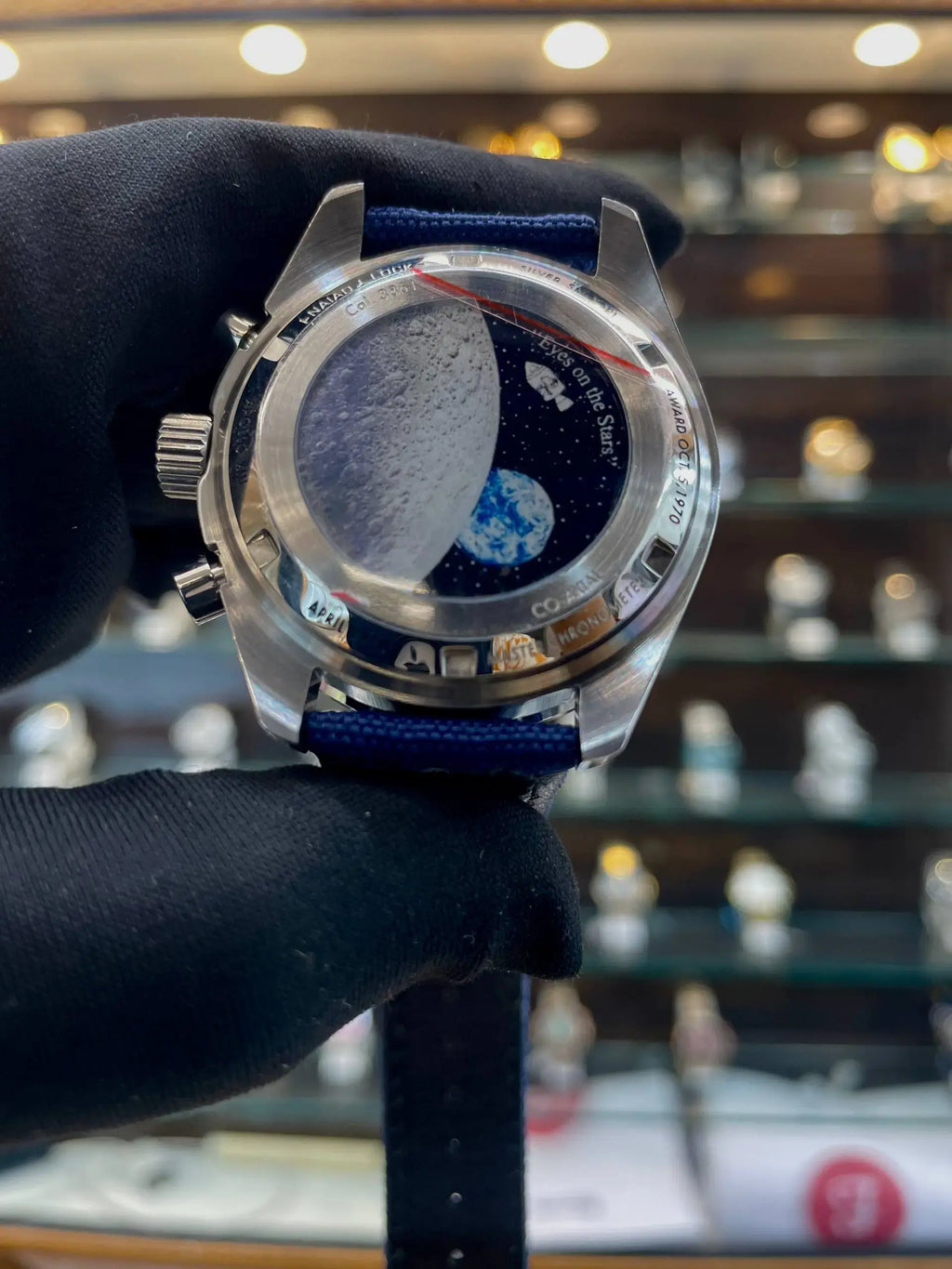 Omega speedmaster 50th anniversary silver snpooy award in master piece