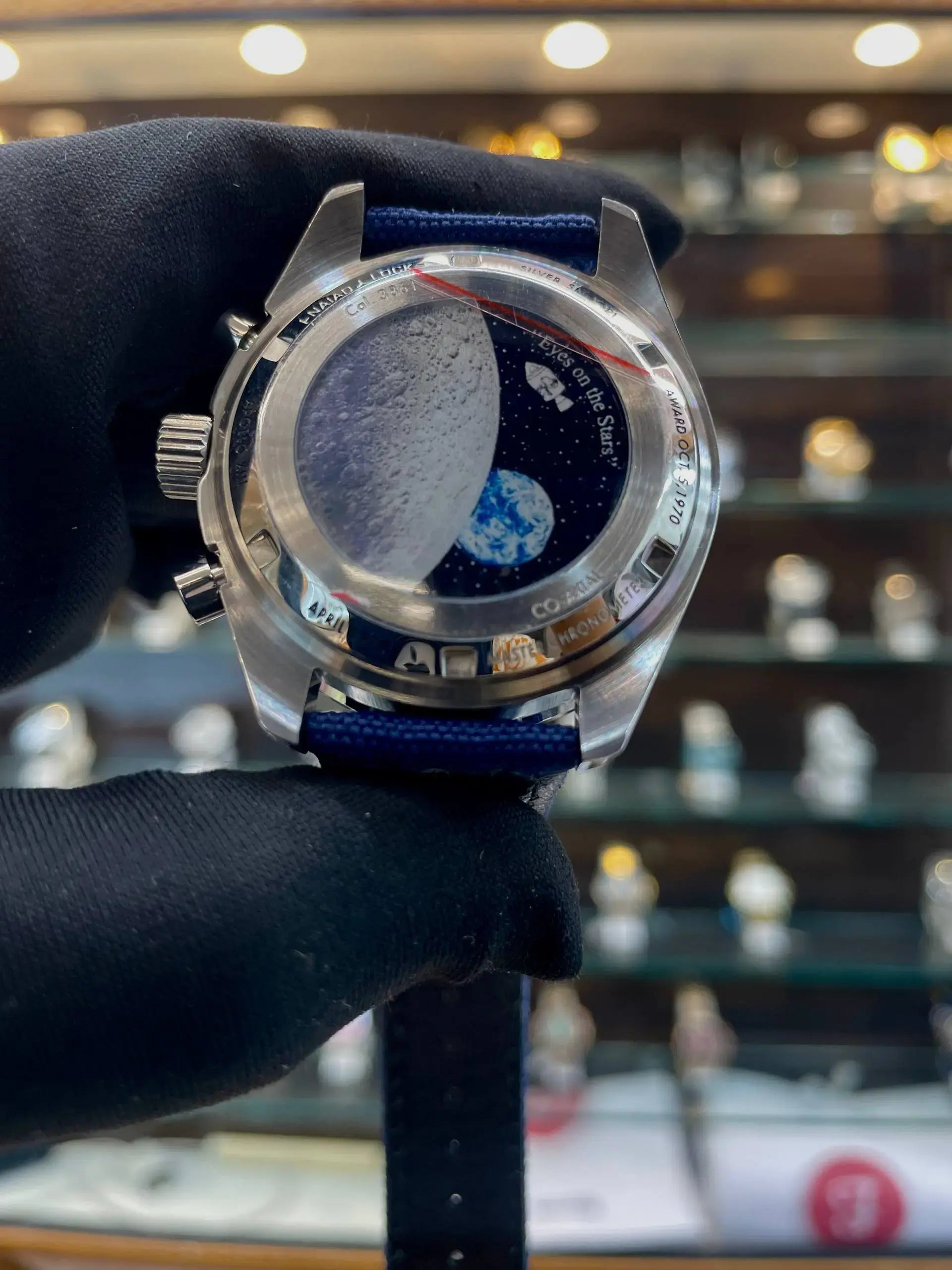 Omega speedmaster 50th anniversary silver snpooy award in master piece