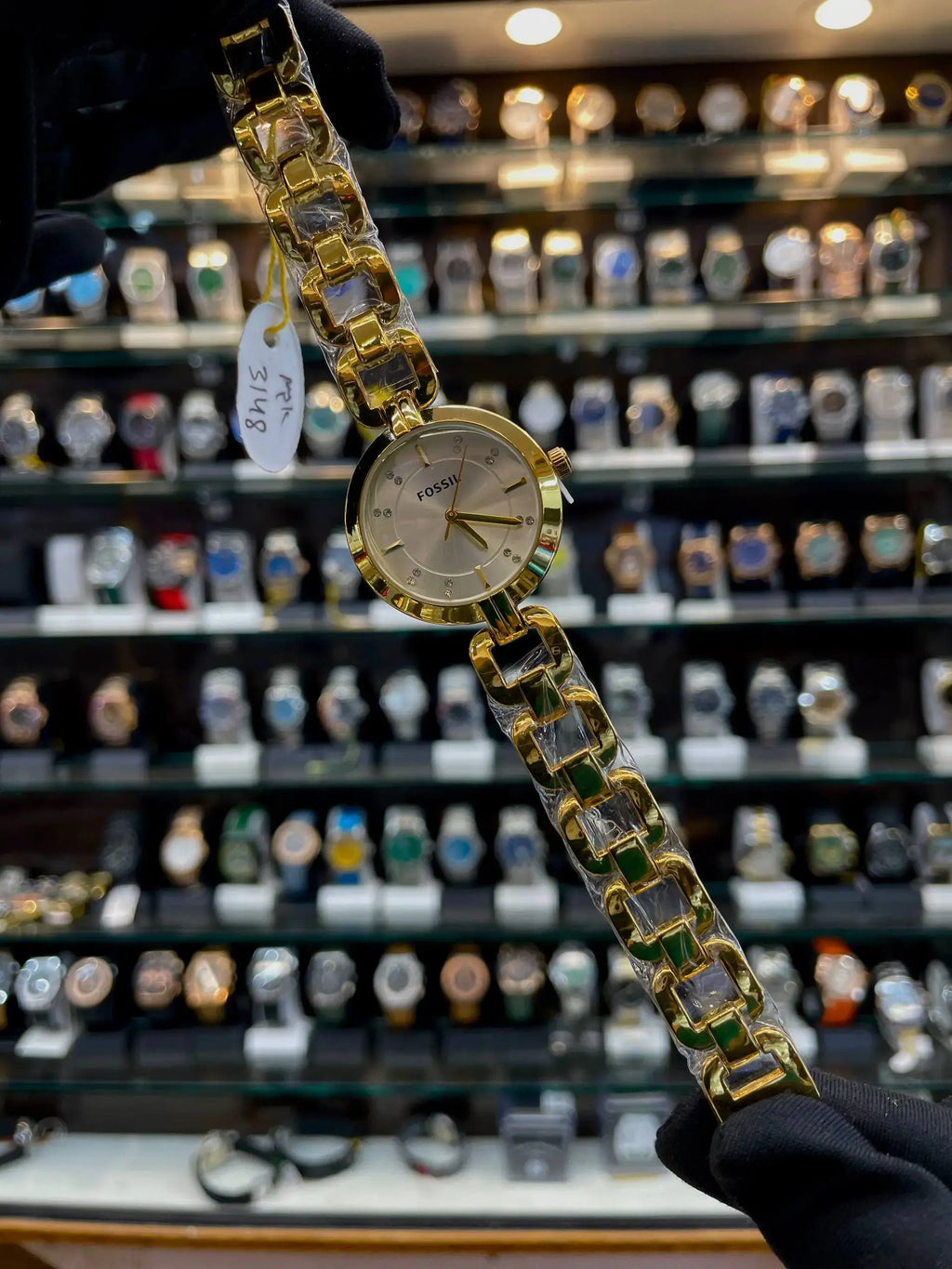 Fossil girls watch under budget in gold white diamond dial