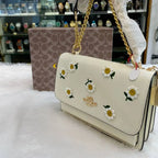 Coach girls premium sling bag flower body