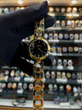 Fossil girls watch under budget in gold