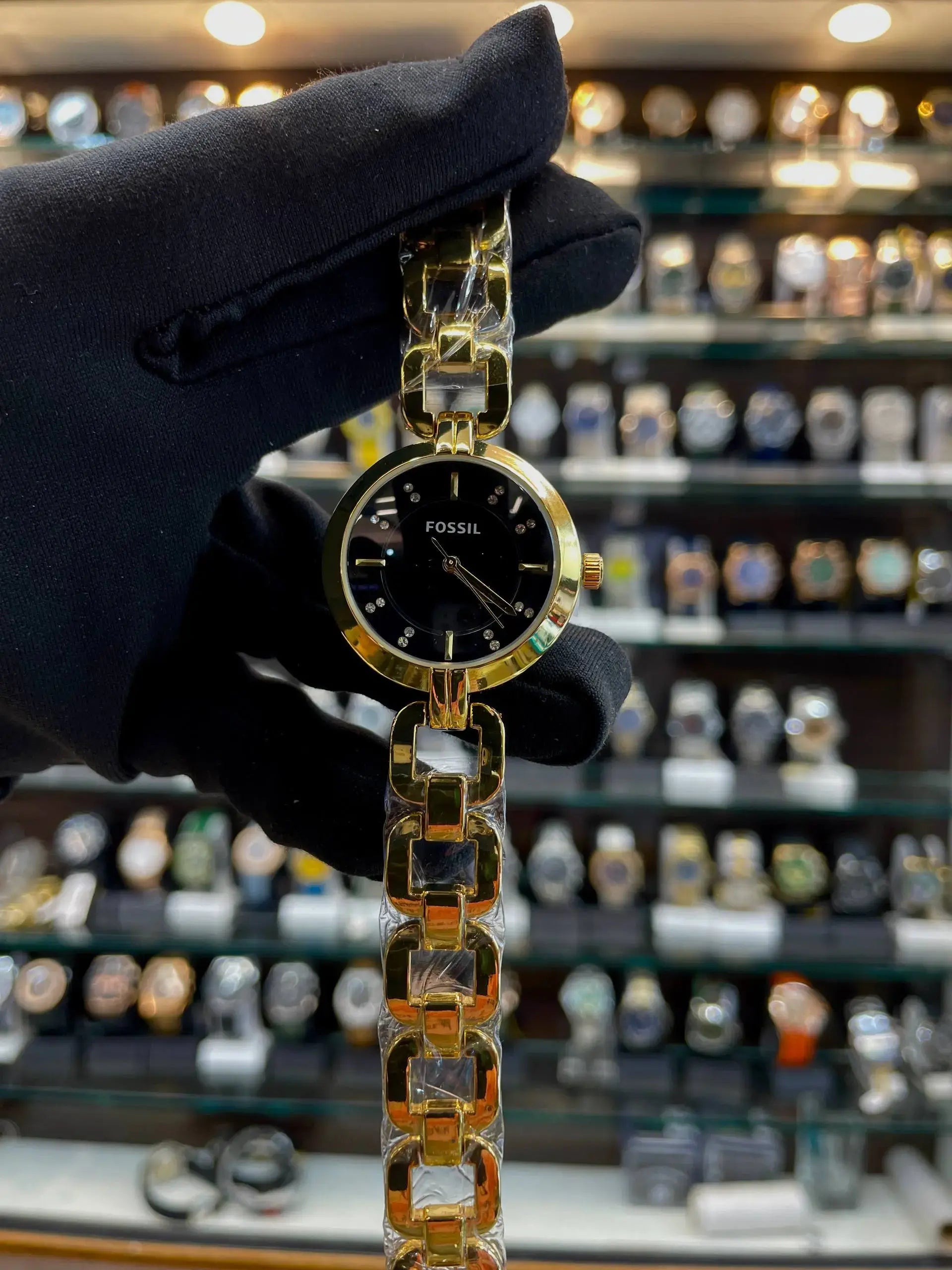 Fossil girls watch under budget in gold