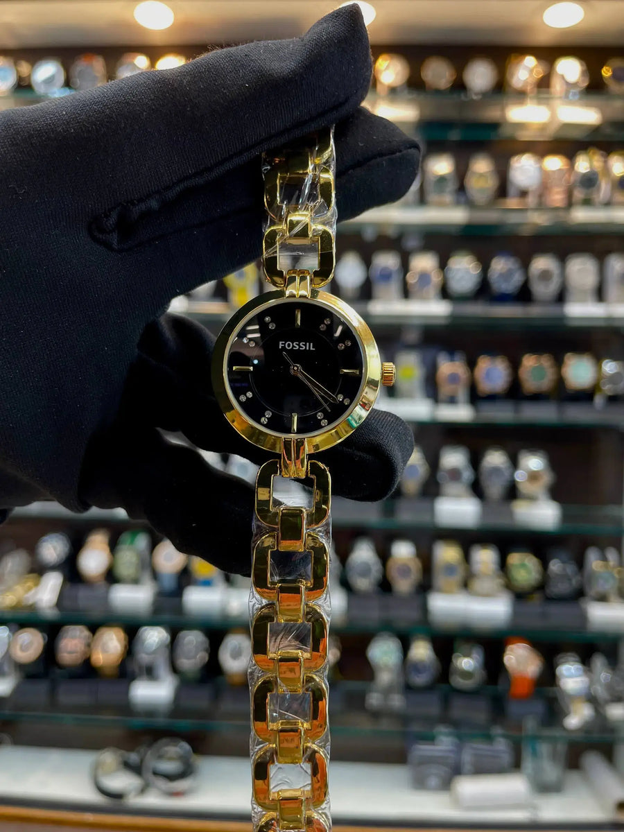 Fossil girls watch under budget in gold