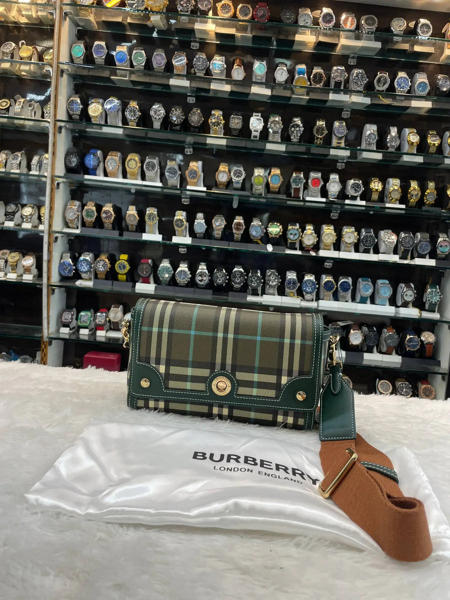 Burberry checks cross body sling bag in master piece for girls