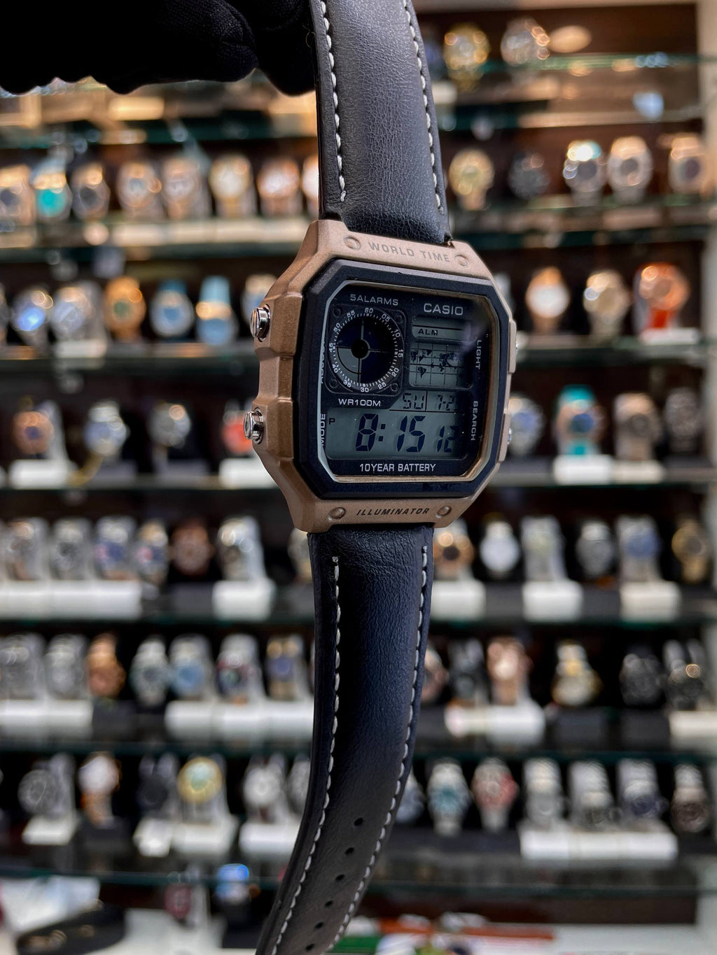 Casio AE-1200WH-1A black leather digital watch side view