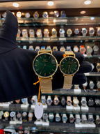 Daniel Wellington couple gold chain watch set front view