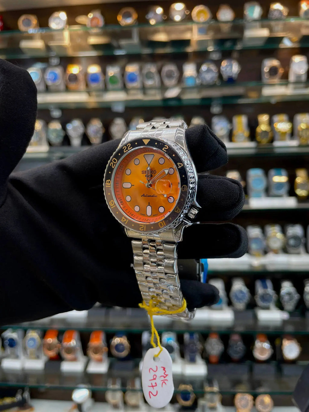 Seiko gmt now in under budget for mens silver in orange dial