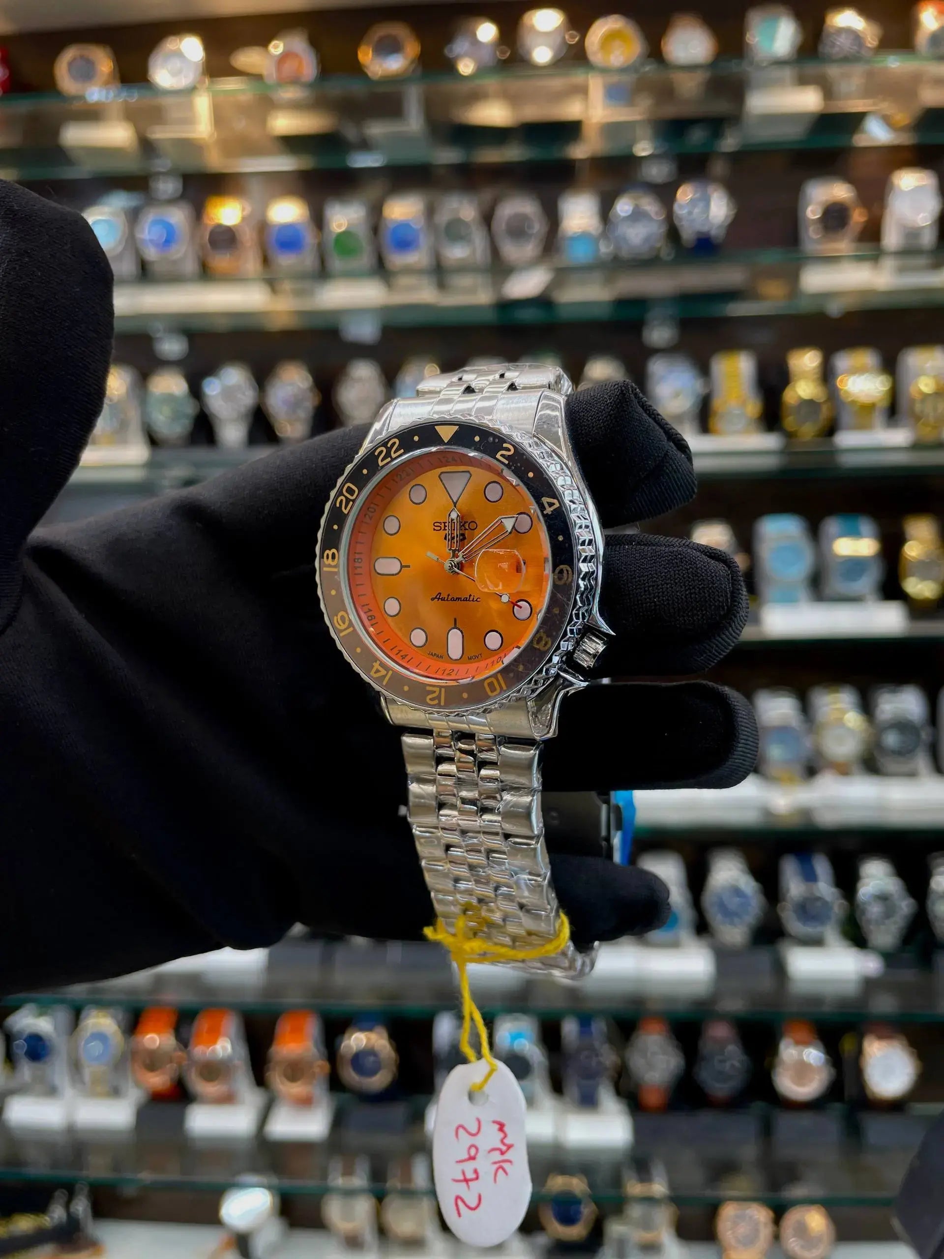 Seiko gmt now in under budget for mens silver in orange dial