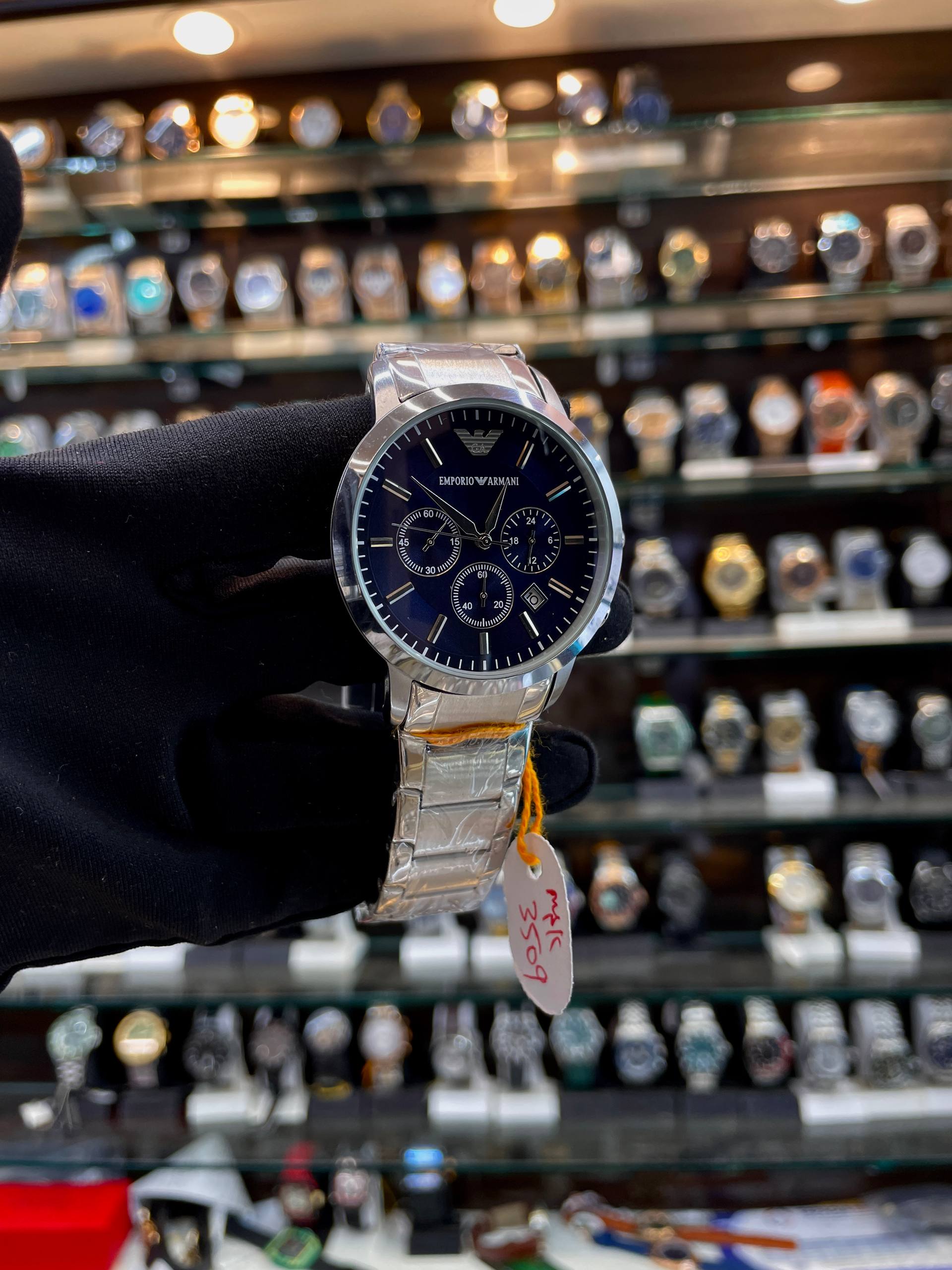 Emporio Armani navy blue dial watch close up