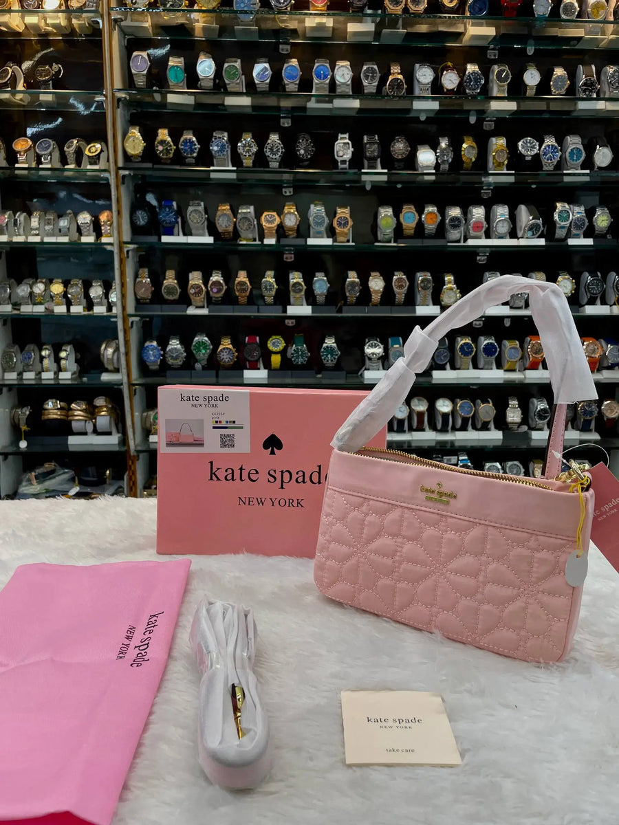 Kate spade new york pink flower quilted sling bag
