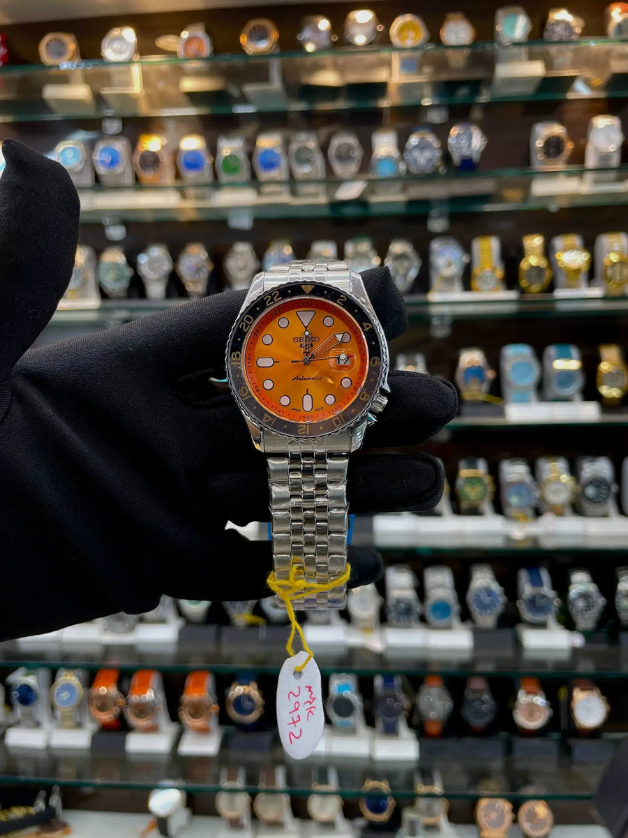 Seiko gmt now in under budget for mens silver in orange dial