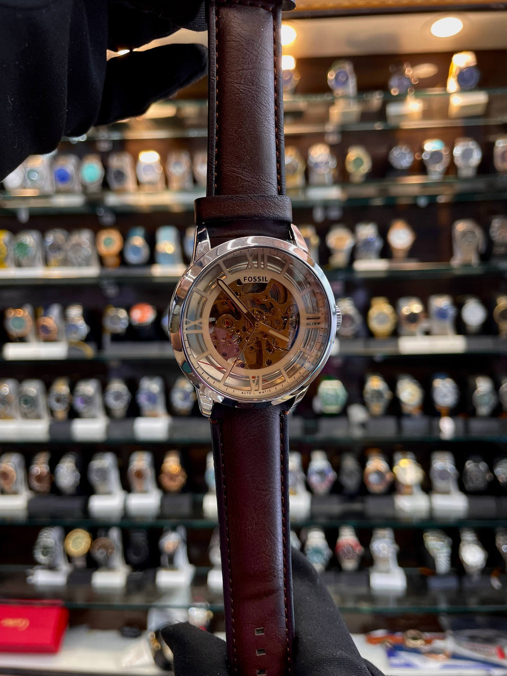 Fossil automatic brown lens watch close up