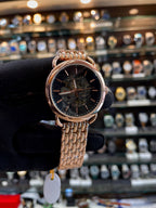 Fossil automatic rose gold watch close up