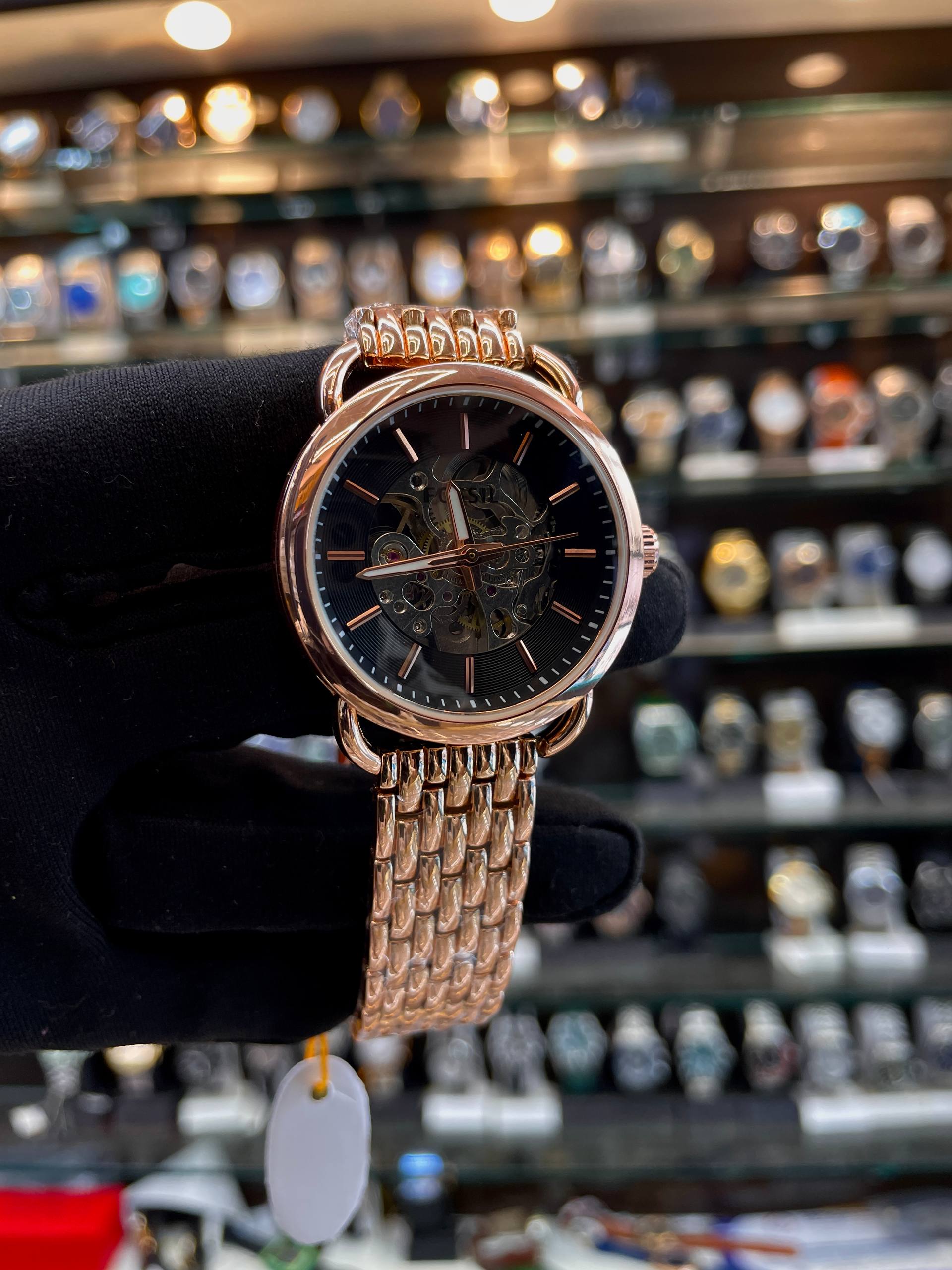Fossil automatic rose gold watch close up