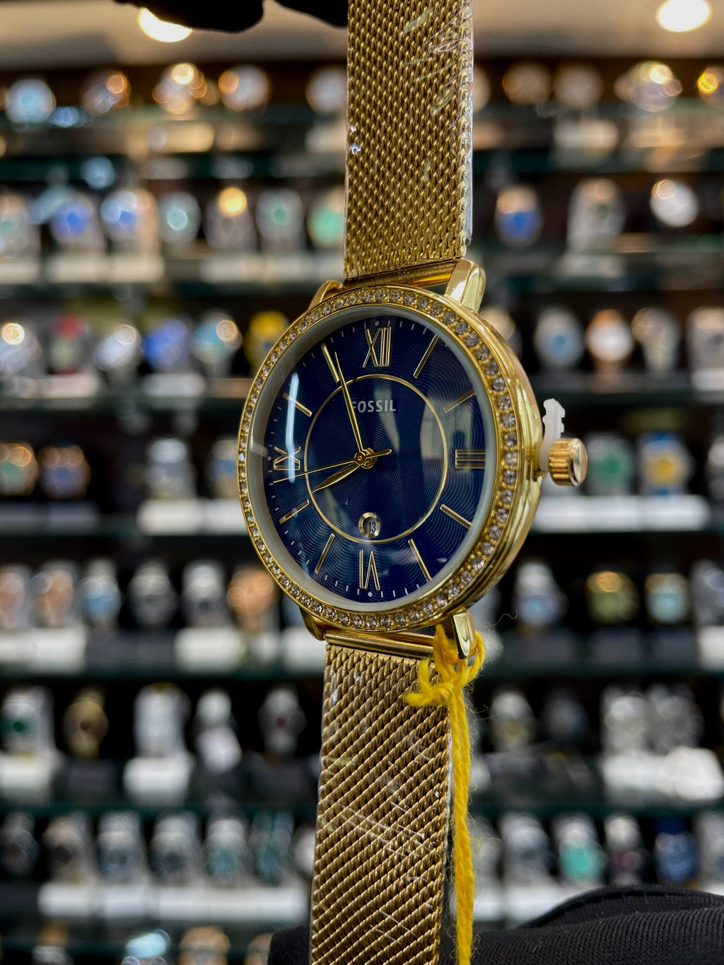 Fossil blue slim strap girls watch side view