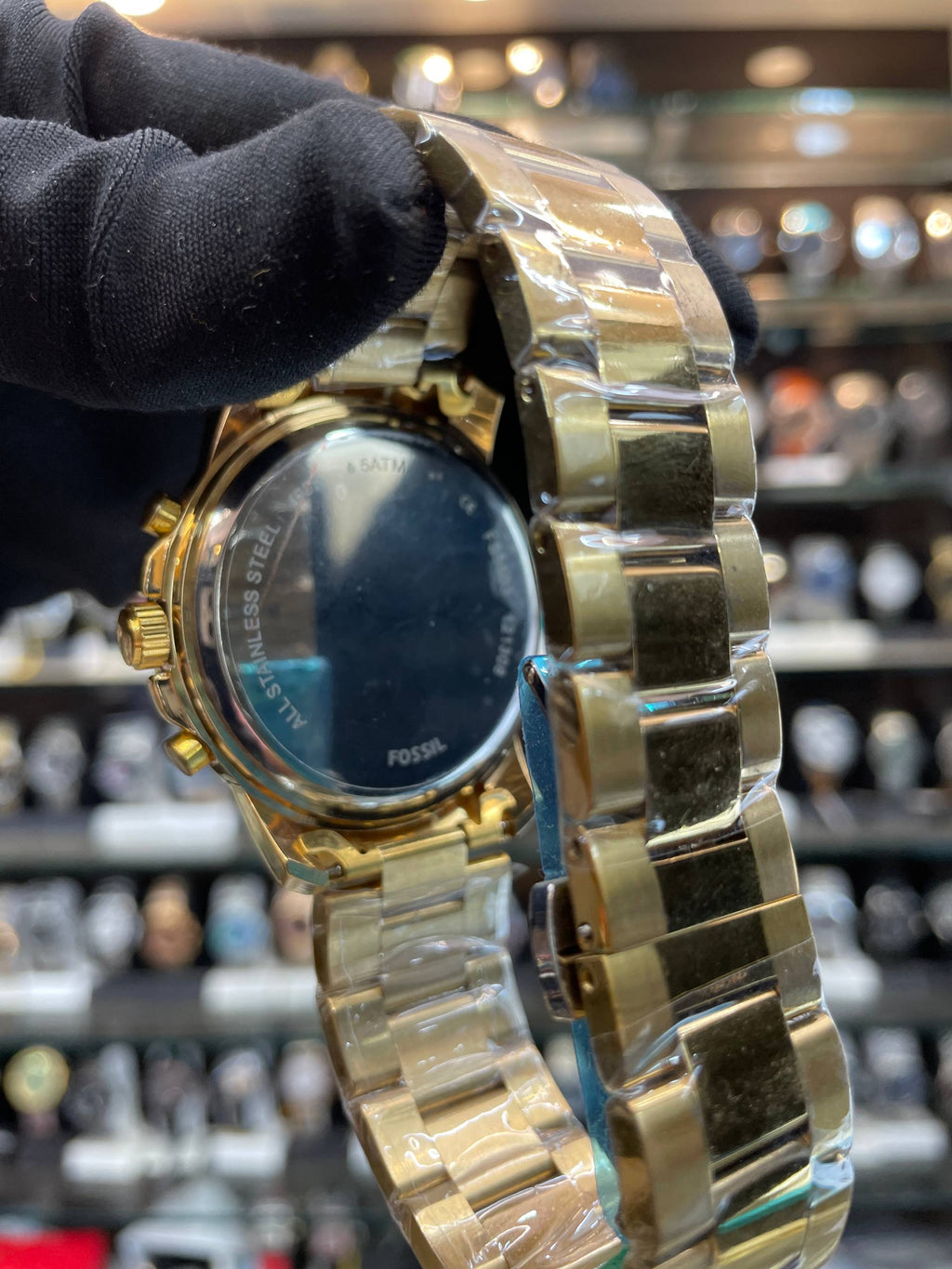 Fossil men's chain watch back view