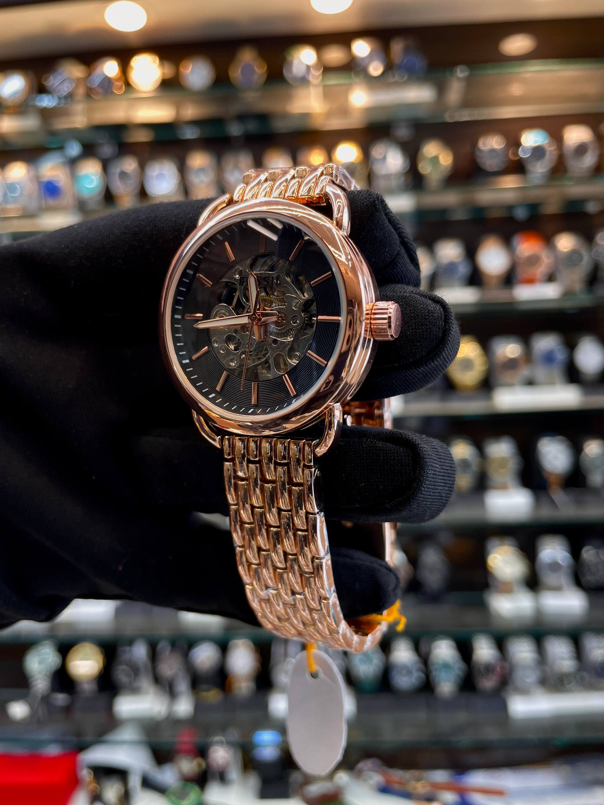 Fossil rose gold automatic girls watch side view