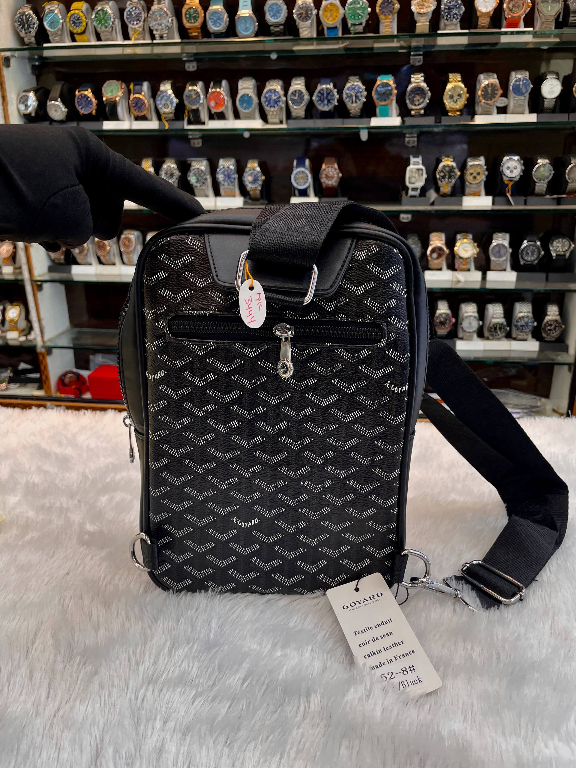 Goyard black canvas crossbody messenger bag backside view