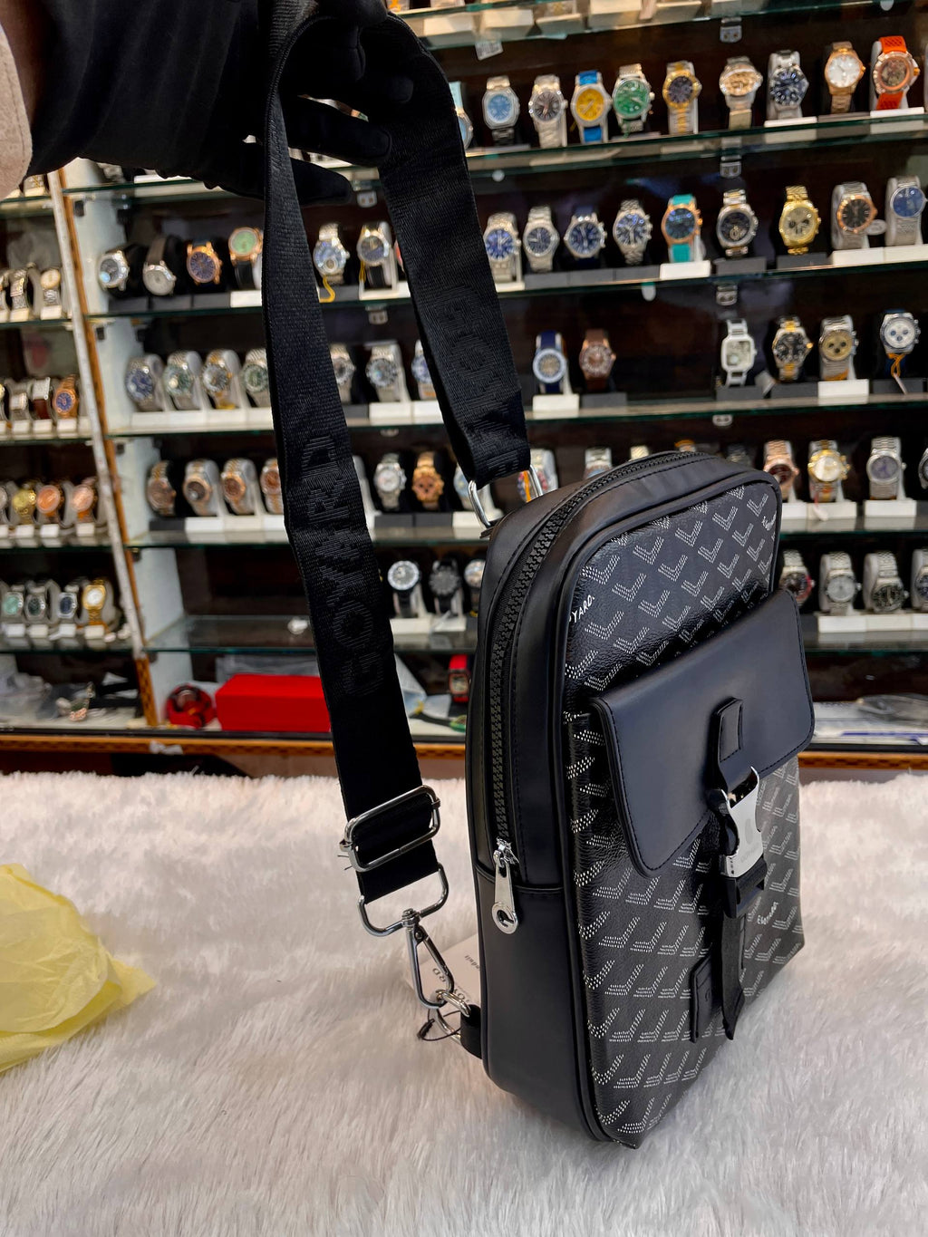 Goyard black canvas crossbody messenger bag side view