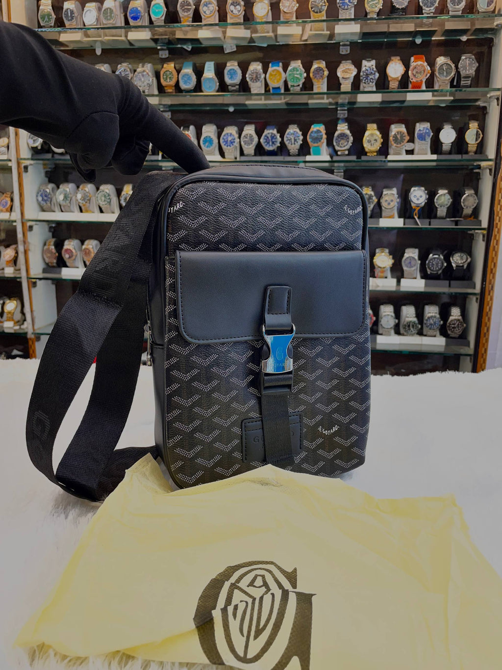 Goyard black chevron pattern canvas crossbody messenger bag front view