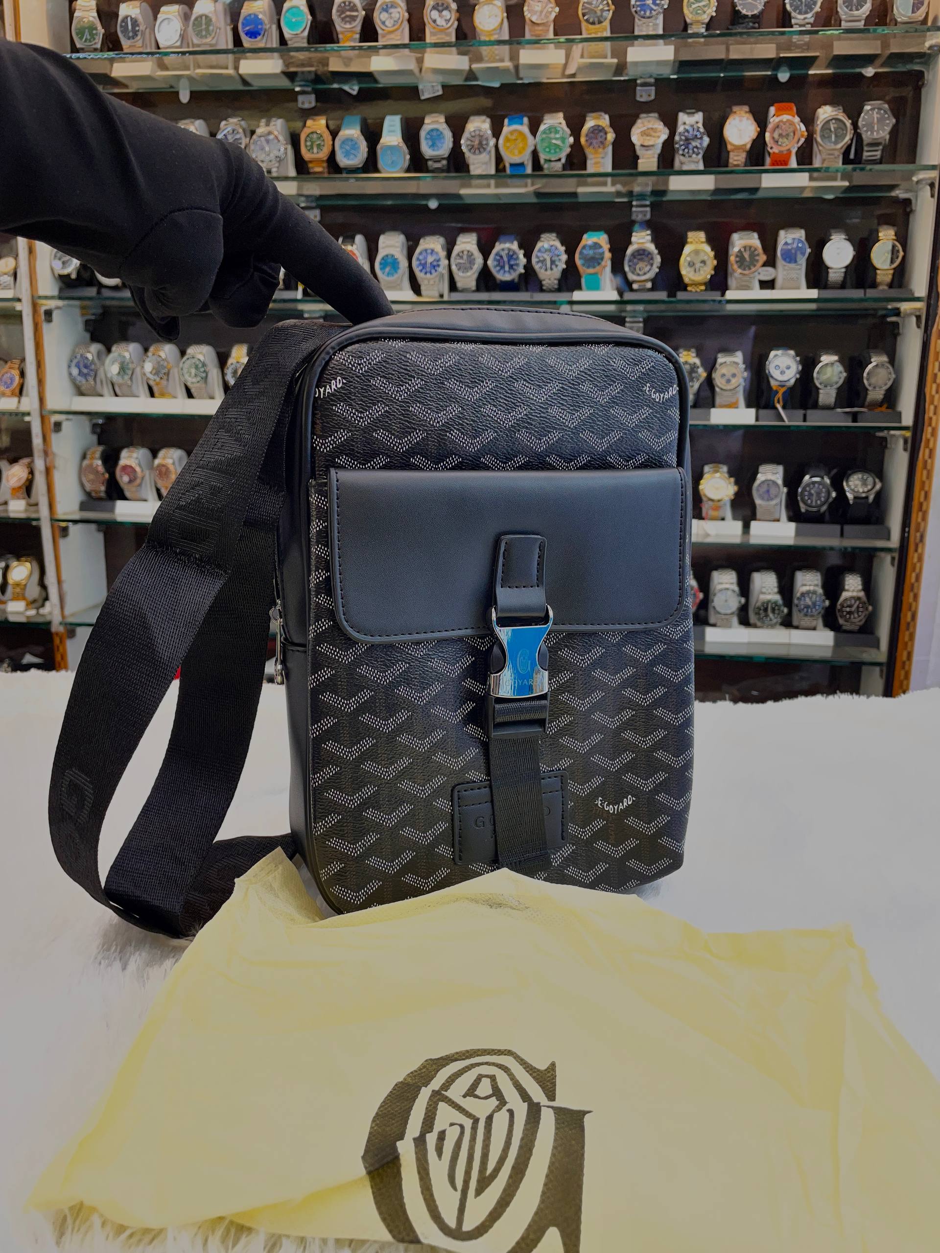 Goyard black chevron pattern canvas crossbody messenger bag front view