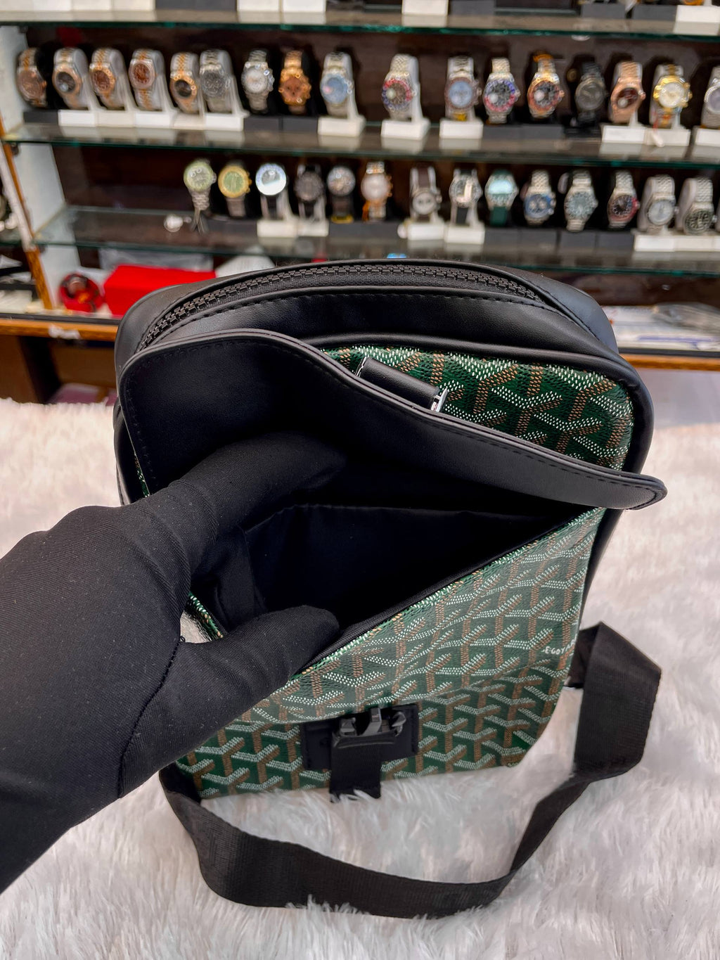 Goyard green crossbody messenger bag interior with zip open