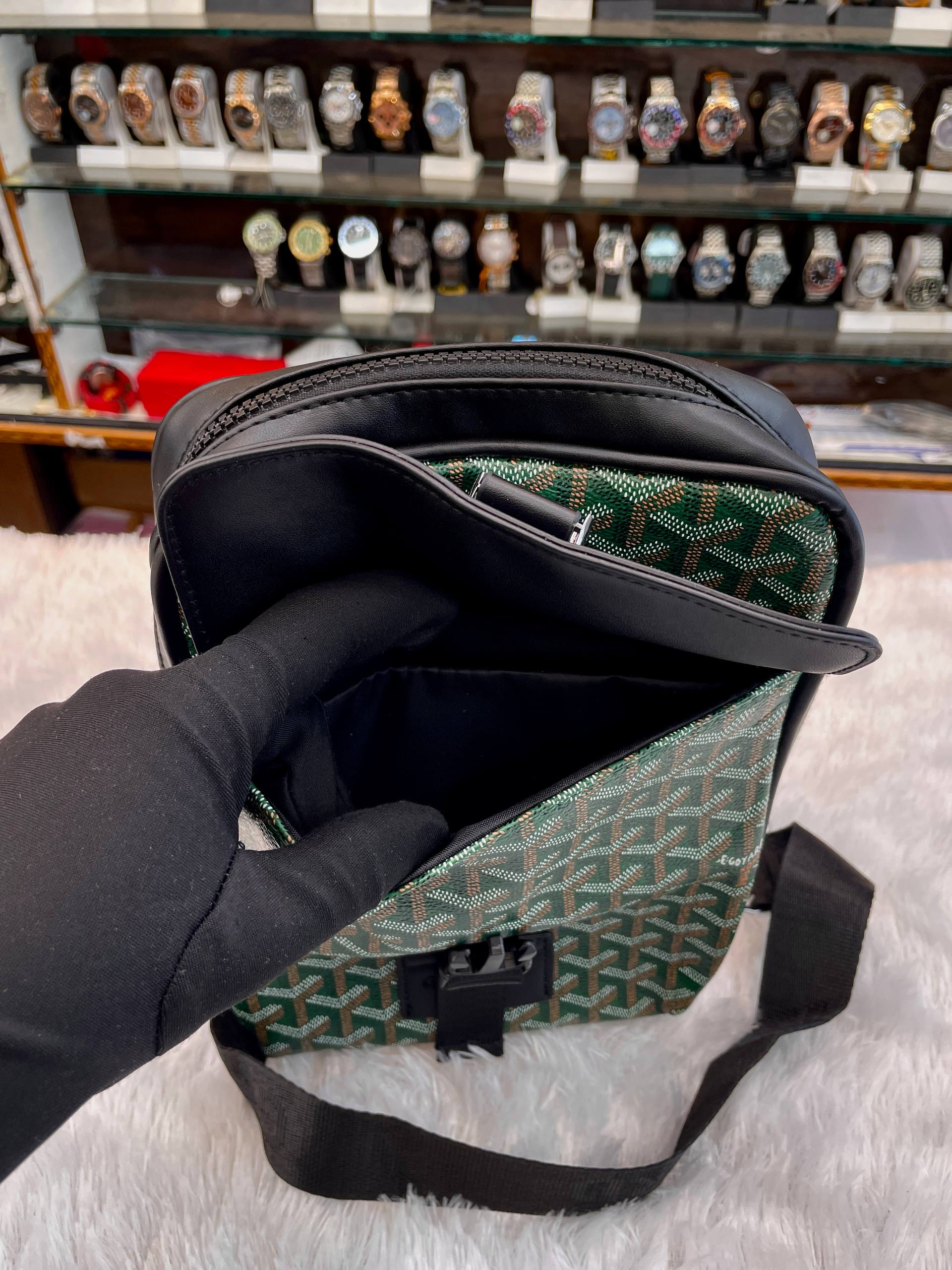 Goyard green crossbody messenger bag interior with zip open