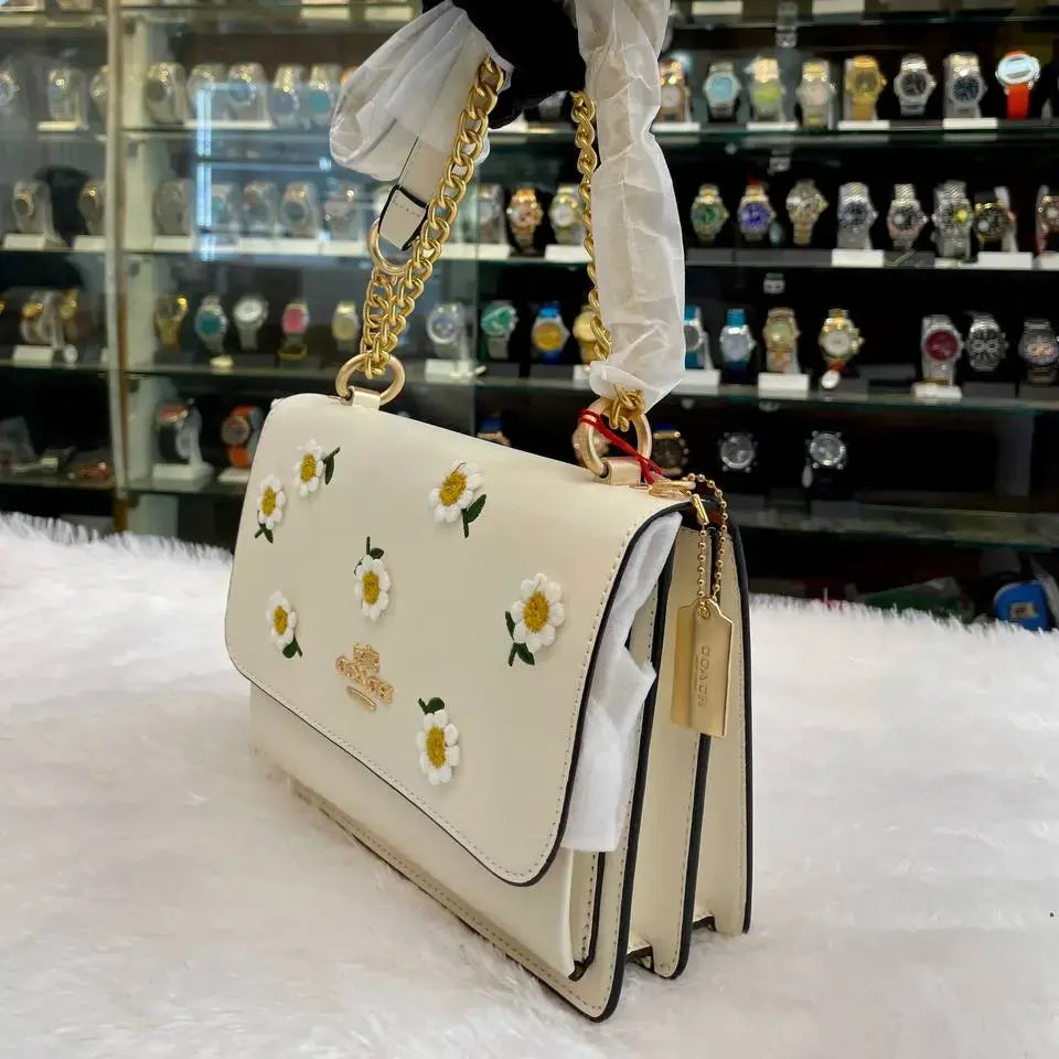 Coach girls premium sling bag flower body