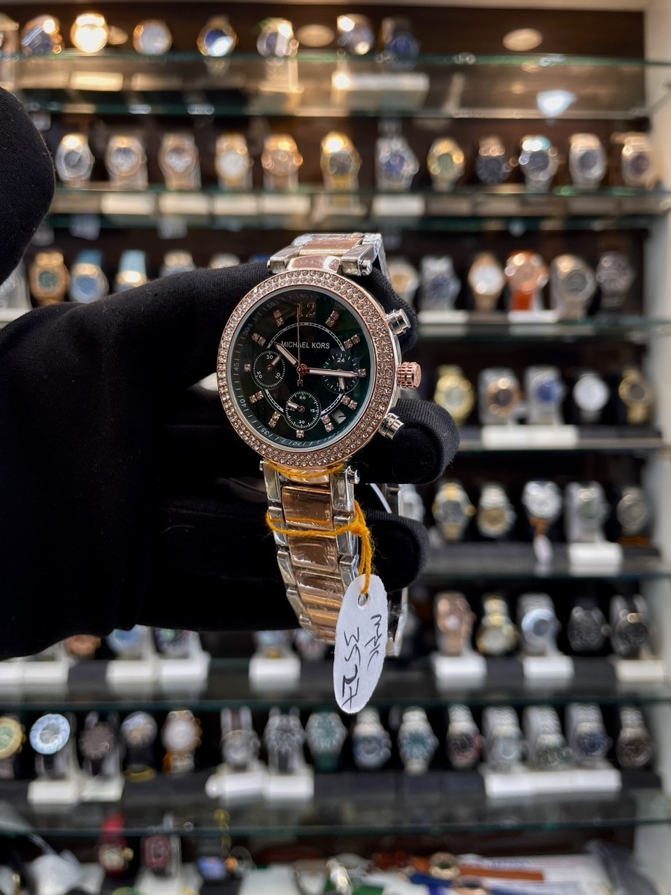 Michael Kors green dial girls watch side view