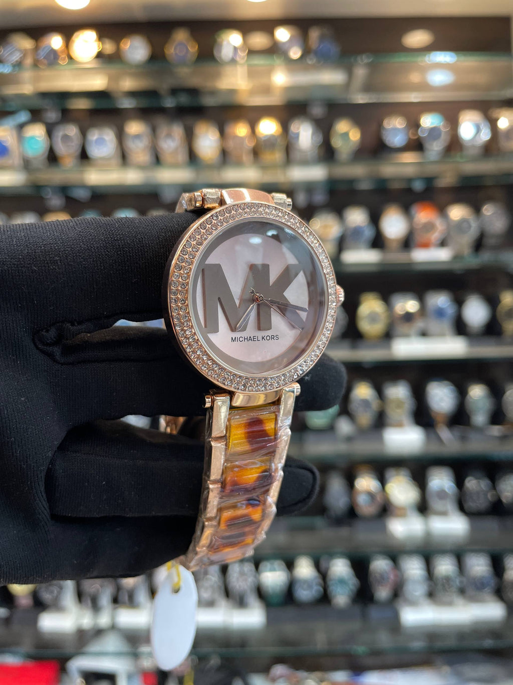 Michael Kors MK logo dial watch close up