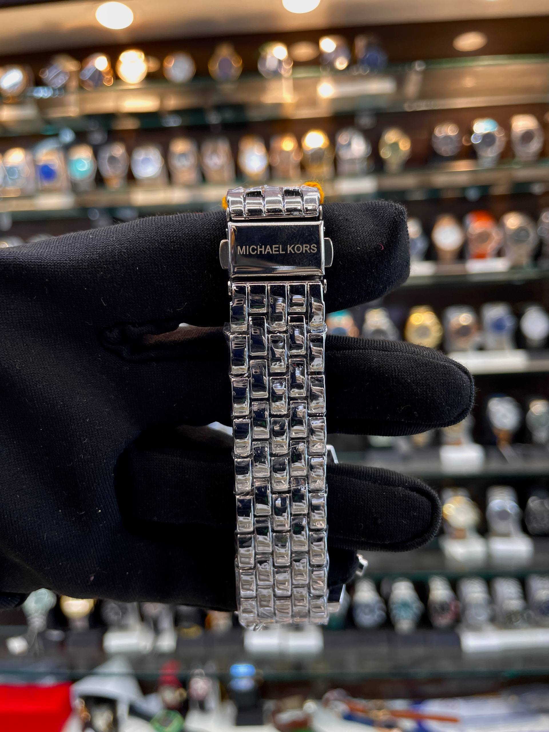 Michael Kors silver dial girls watch strap