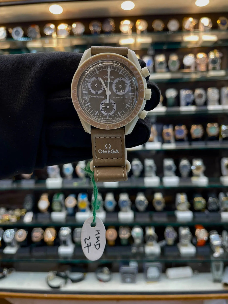 Omega swatch now under budget brown
