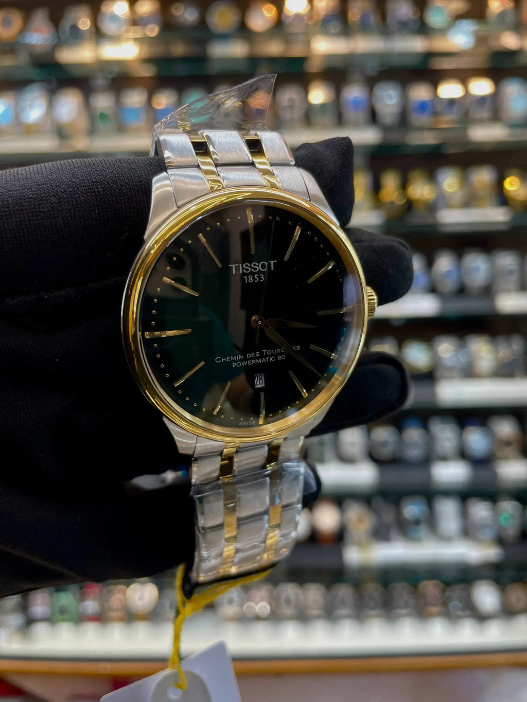 Tissot chemin des tourelles powermatic now in master piece chain green