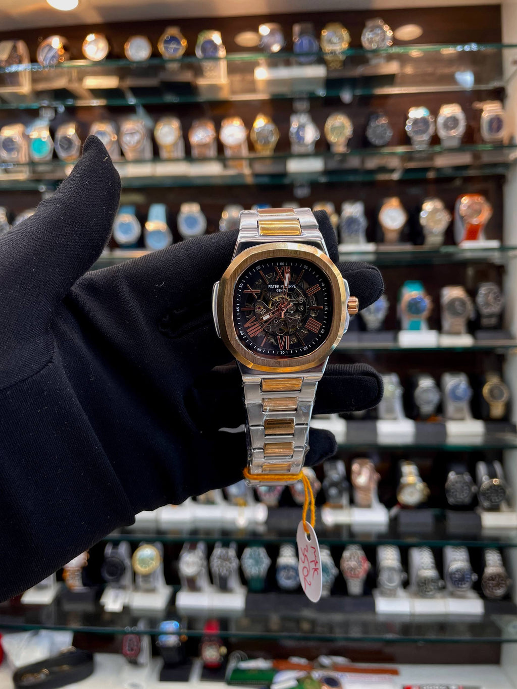 Patek Philippe automatic transparent black dial watch front view