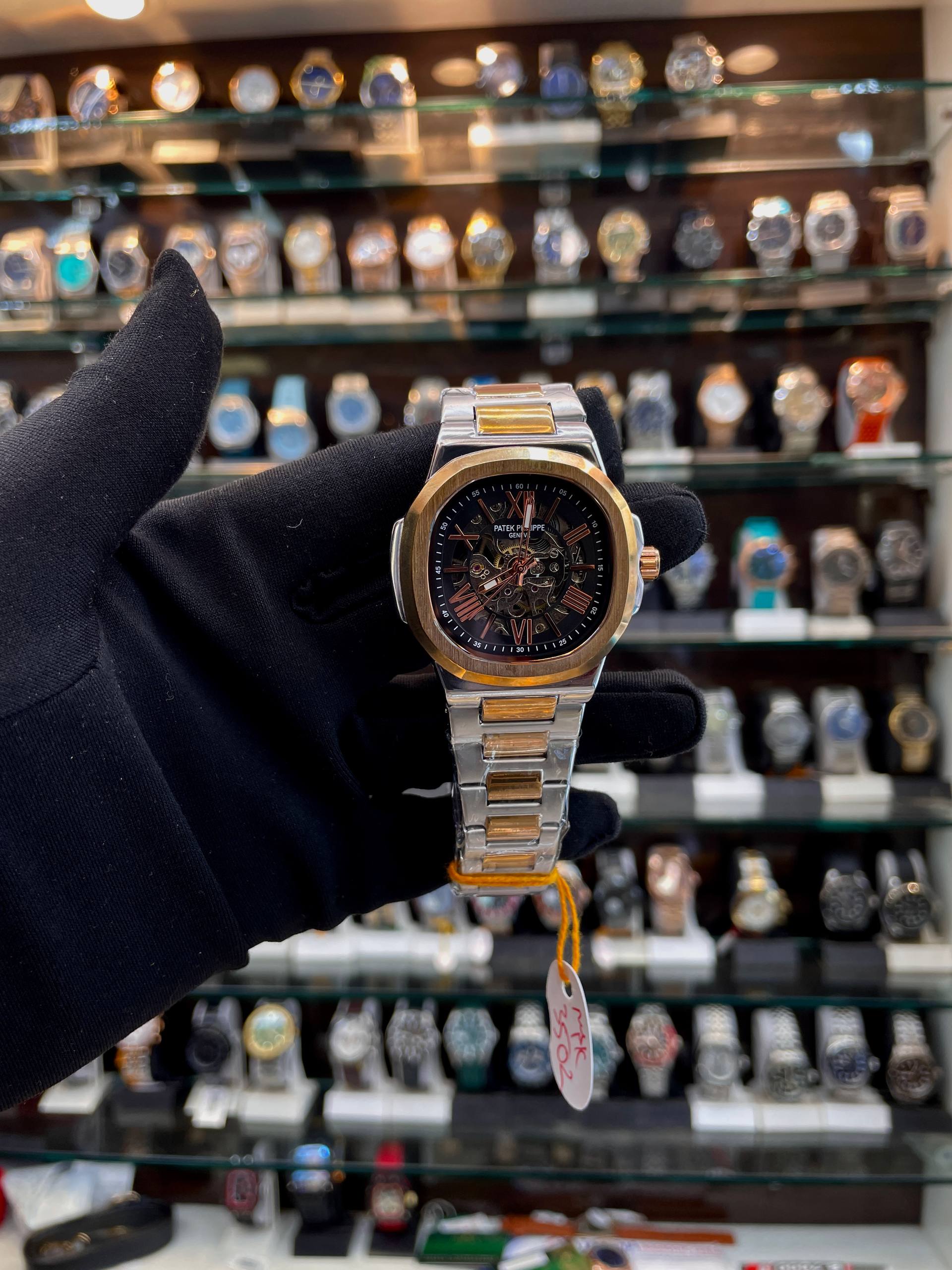 Patek Philippe automatic transparent black dial watch front view
