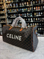 CELINE DUFFLE BAG LARGE VOYAGE BAG IN TRIOMPHE CANVAS WITH CELINE PRINT