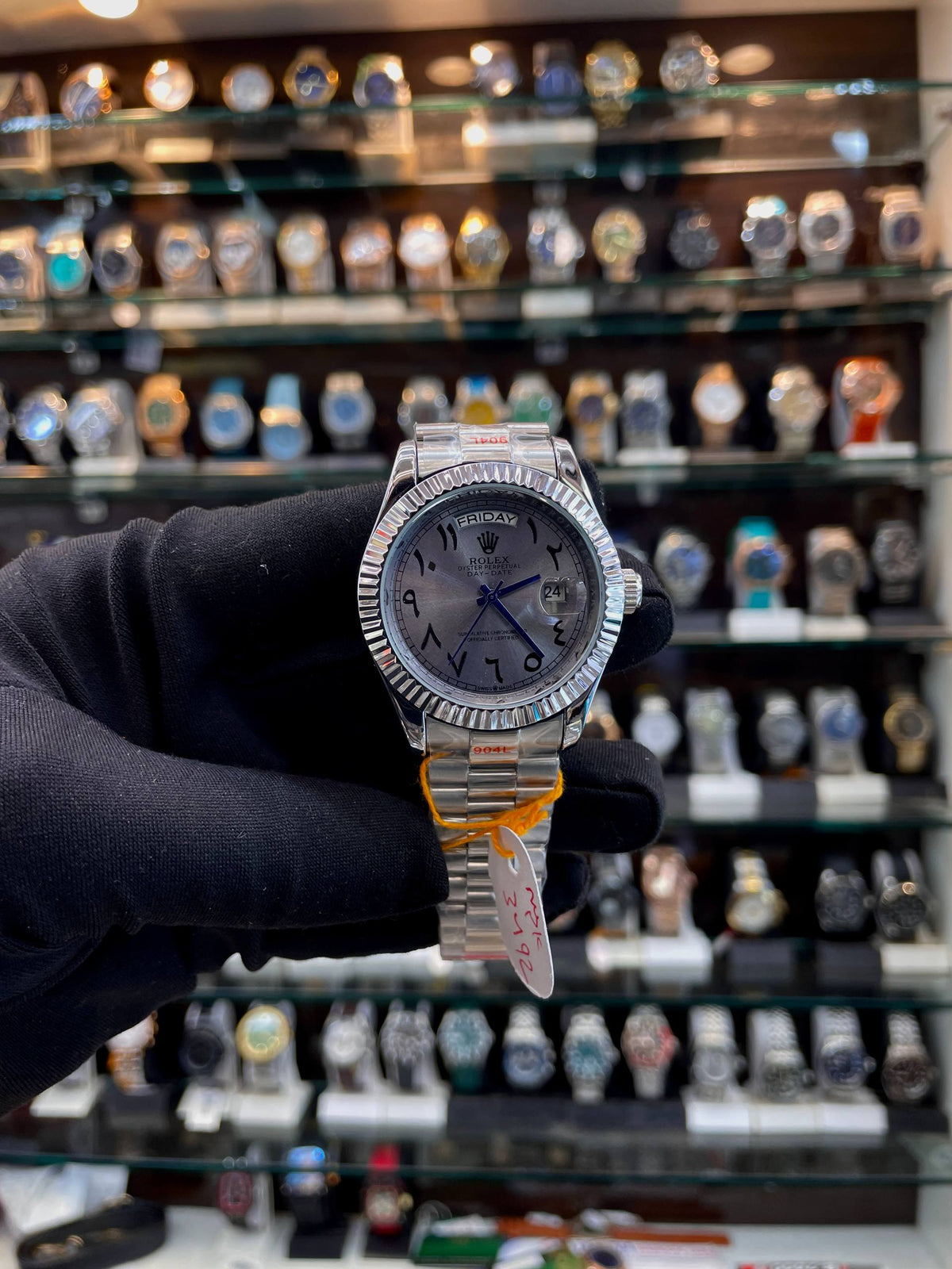 rolex day-date arabic dial automatic watch front view