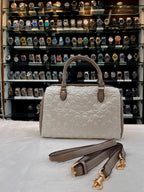 COACH MINI ROWAN CROSSBODY BAG IN BLOCKED SIGNATURE LEATHER